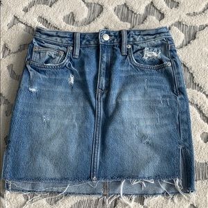 Denim skirt with raw hem